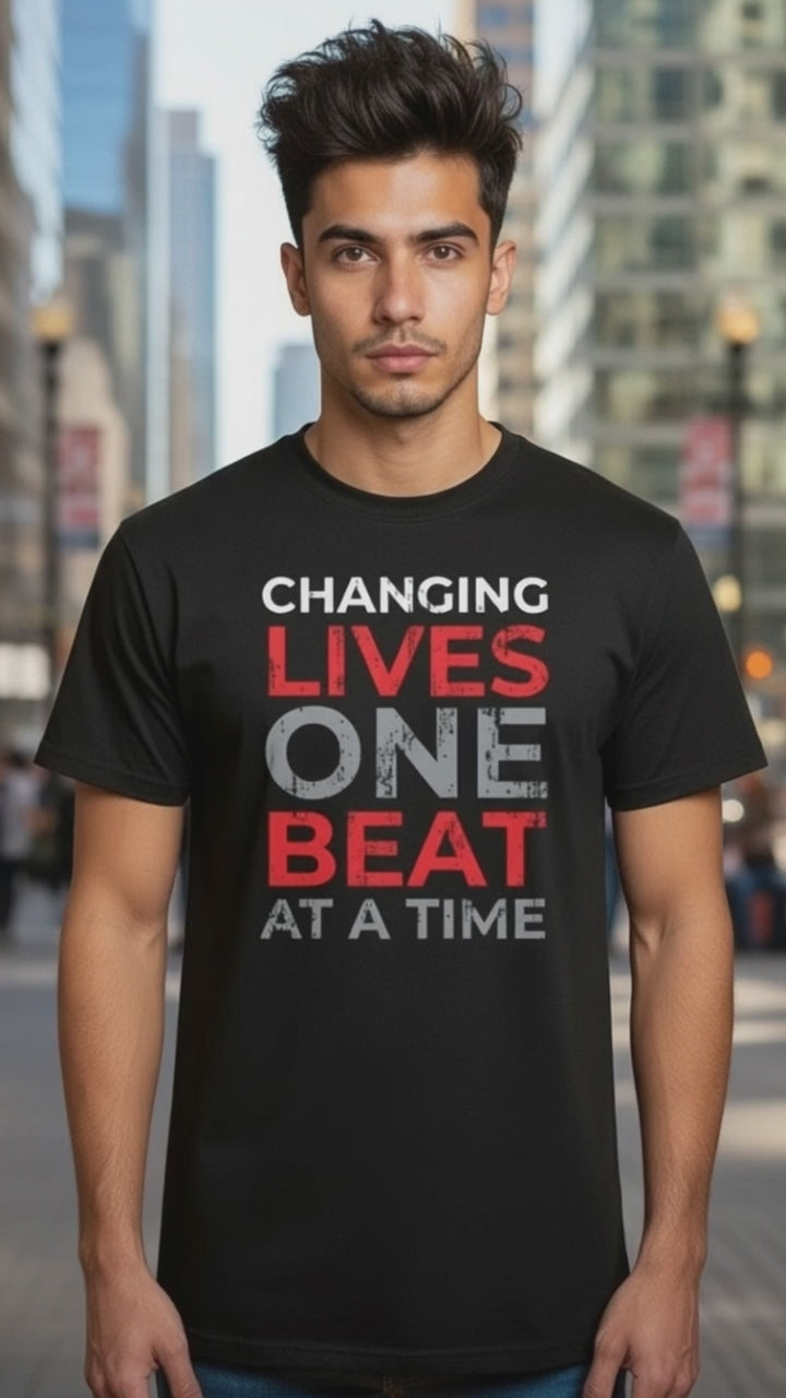 Black Short Sleeve T-Shirt "Changing Lives One Beat At A Time"